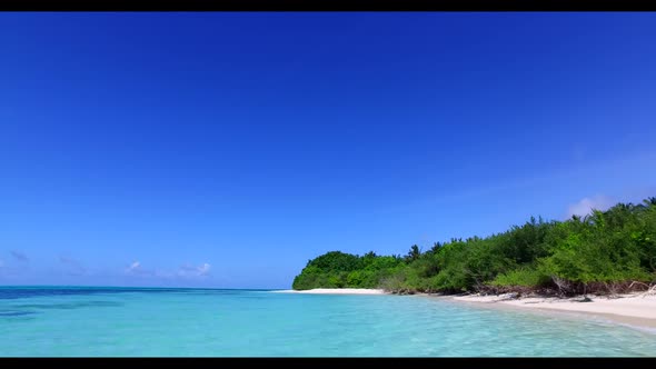 Aerial drone abstract of tranquil coast beach time by turquoise lagoon with clean sand background of