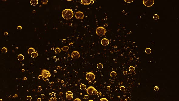 Super Slow Motion Shot of Moving Oil Bubbles Isolated on Black Background at 1000Fps