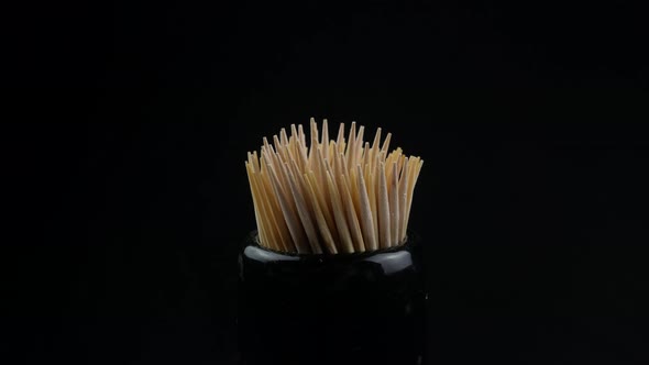 Close up of a group of wooden toothpicks