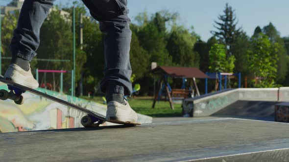 Skateboarder doing a crooked grind trick