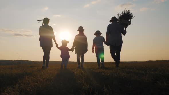 Silhouette Farmers Family of Organic Farming and Healthy Lifestyle, Healthy Food, Happiness and Joy