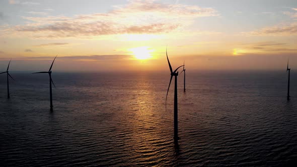 Windmill Park in the Ocean Drone Aerial View of Windmill Turbines Generating Green Energy Electric