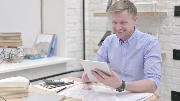 Businessman Video Calling on Tablet