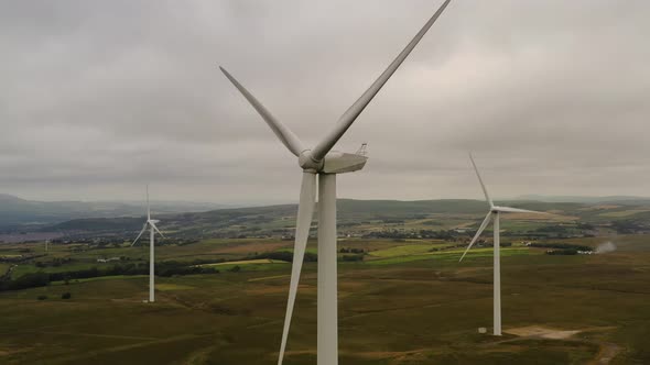 Aerial views over a wind farm on moorland