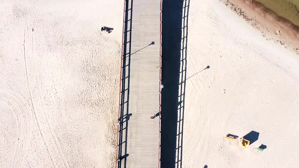 Almost empty bridge of Palanga in aerial tilting up view