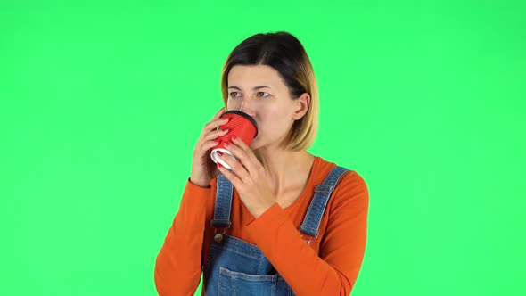 Girl Drinks Unpalatable Coffee and Is Disgusted on Green Screen