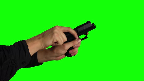 Slow Motion Hand Firing Gun on Chroma Key Green Screen Background 1