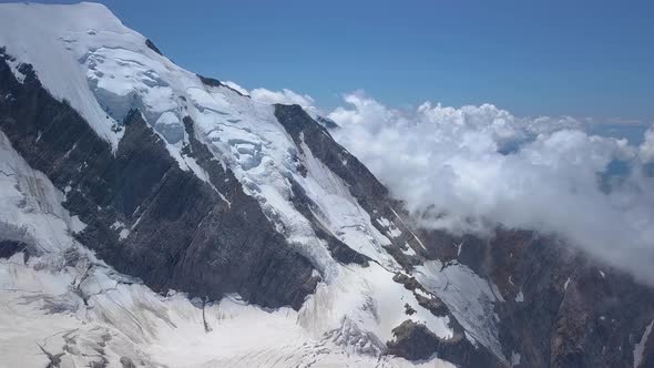 Flying Over Bionnassay Glacier in the Alpine Mountains