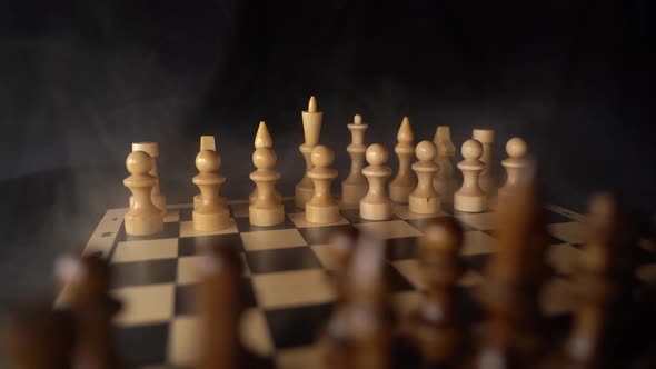 Close Up of White Chess Pieces on Board with Dissipating Steam