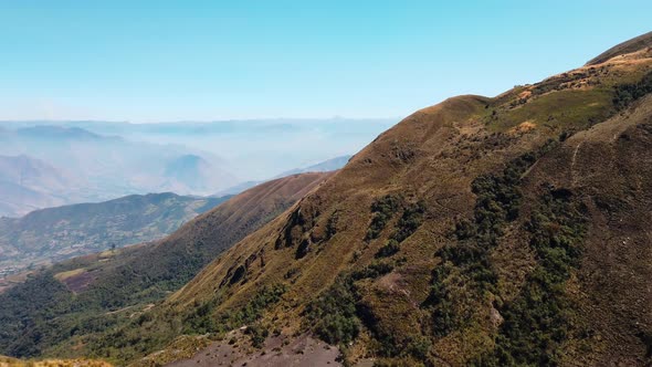 4k daytime video revealing a deep valley into the Peruvian Andes. Trekking at the 5 Lakes of Pichgac