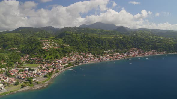 Aerial of houses and green landscape along Caribbean Coast, Saint-Pierre
