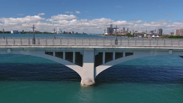 Establishing shot of the Douglas MacArthur Bridge over the Detroit river. This video was filmed in 4