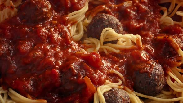 Hot Pasta Sauce Poured On Spaghetti And Meatballs