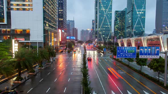 Timelapse Futian Wet Road Reflects Headlights in Shenzhen 