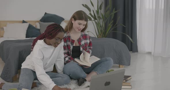 Multi Ethnic Girls Studying Together at Home