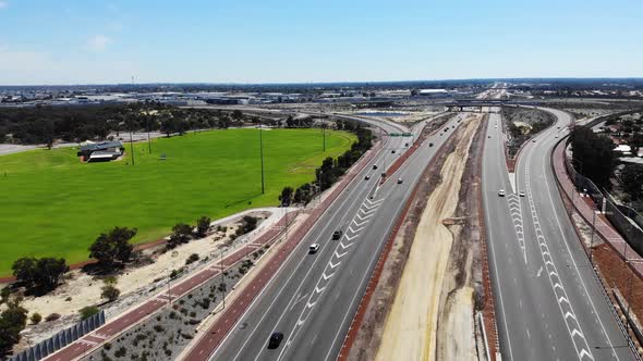 Aerial View of a Busy Freeway near an Oval in Australia