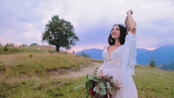 Young bride on mountains background