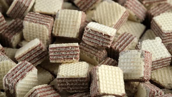 Cocoa wafers close up, rotation. Waffle bar