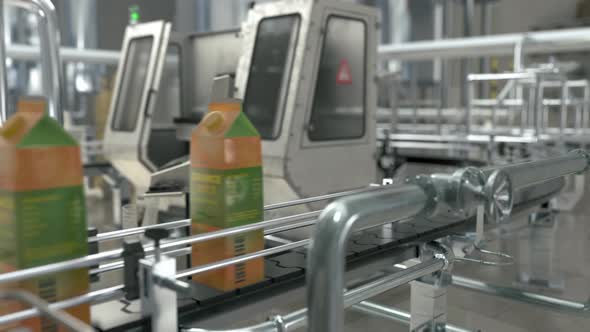 Industrial Machinery Transports Juice Packs To Manufacturing Line At Plant