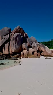 Anse Cocos La Digue Seychelles Young Asian Woman on a Tropical Beach During a Luxury Vacation in the