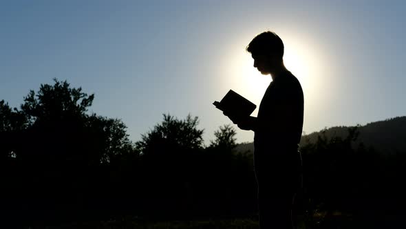 Silhouette Man Reading Quran