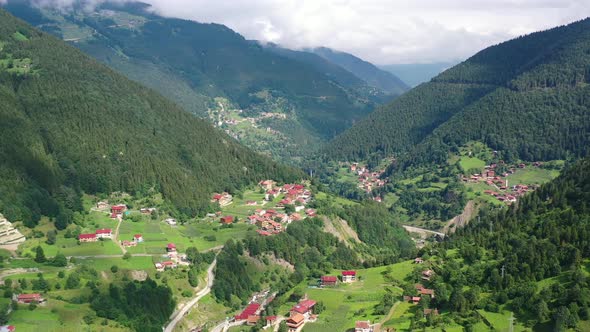 aerial panoramic landscape view of a beautiful mountain village in Uzungol Trabzon on a sunny summer