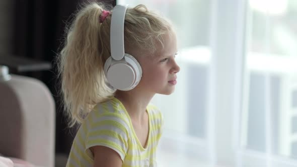 Portrait Beautiful Smiling Girl in Headphones