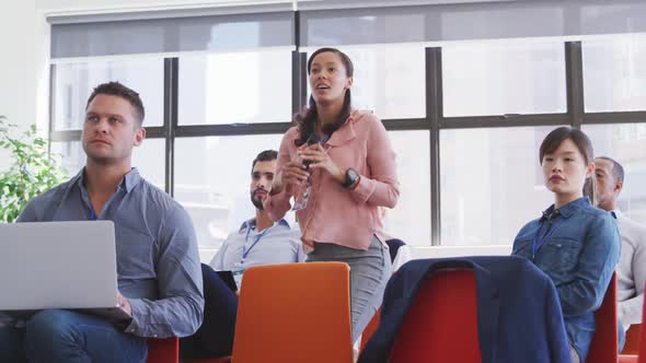 Business people attending to a meeting in conference room