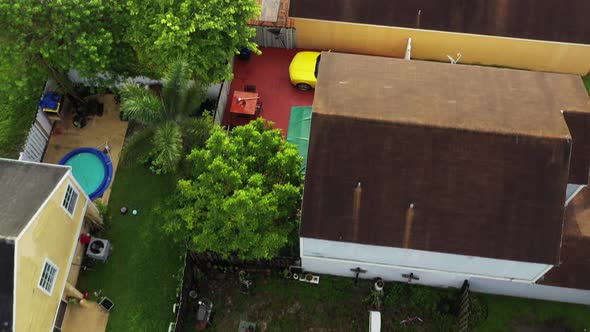 Aerial Drone Flying Over Backyards In A Residential Neighborhood