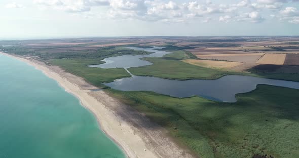 Beautiful landscape of lake, forest, beach and sea. Ezerets and Shabla lakes