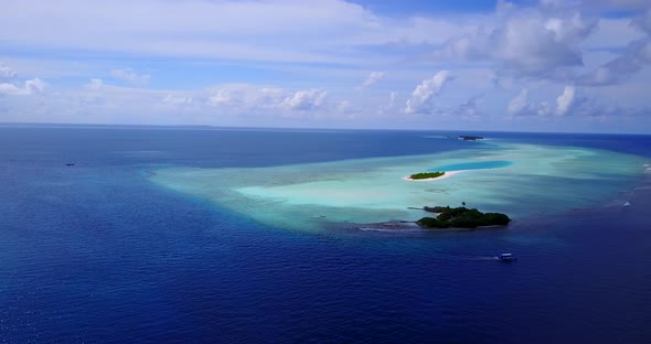 Wide angle drone abstract view of a paradise sunny white sand beach and blue sea background in hi re