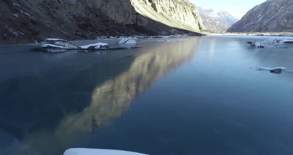 Drone flying over glacier lagoon in Tibet,China.Aerial view drone footage 