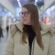 Young Woman Standing and Looking at Camera in Shopping Mall or Trade Center - VideoHive Item for Sale