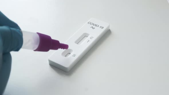 Drop Reagent on the Covid Rapid Antigen Test for Determination of Coronavirus Infection