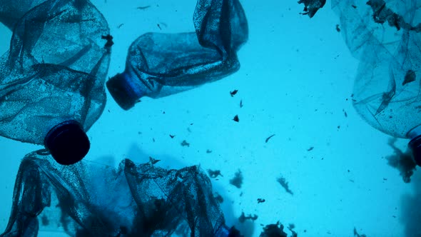 Underwater Footage of Plastic Pollution Problem Concept in Ocean