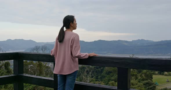 Woman enjoy the view at countryside