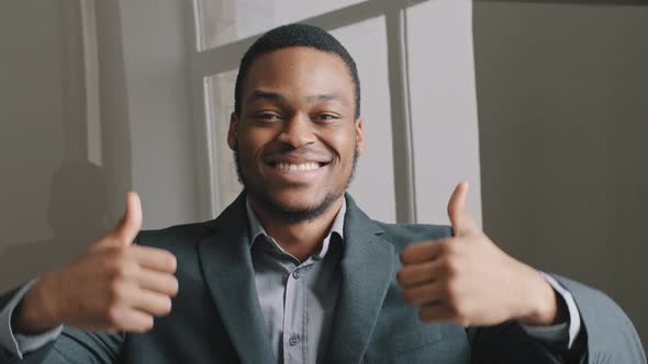 Headshot Happy Confident Young African American Man Showing Thumbs Up Gesture Recommend Good Job