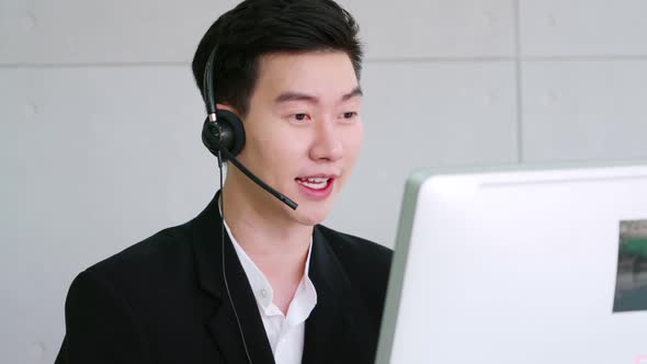 Business People Wearing Headset Working in Office