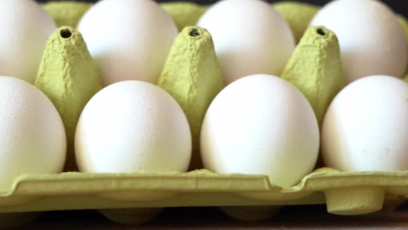 White Chicken Eggs in a Cardboard Tray Close Up