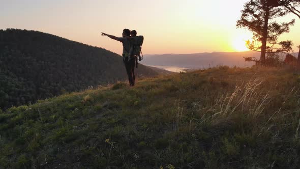 Happy Young Father Showing His Young Child Standing Beautiful Landscape