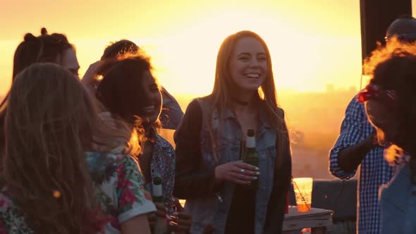 Carefree Friends Partying on Rooftop