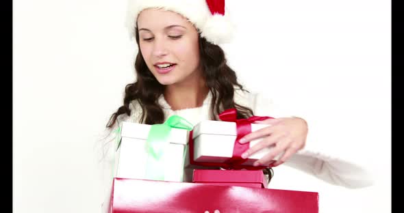 Happy woman holding christmas presents 4k