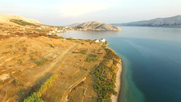 Flying above vacation houses on the island of Pag