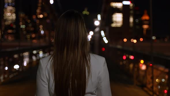 Walking Trough on the Brooklyn Bridge at Night 39