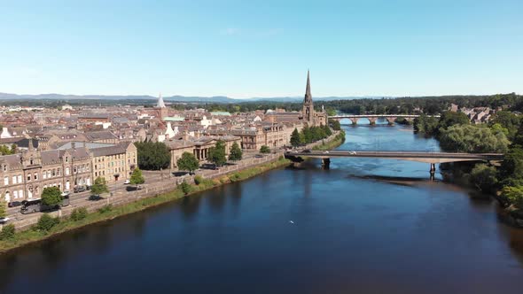 Aerial view above the river Tay and City of Perth. Scotland, United Kingdom. Drone descending.