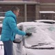 Person Driver Cleans the Car From Snow with a Brush - VideoHive Item for Sale