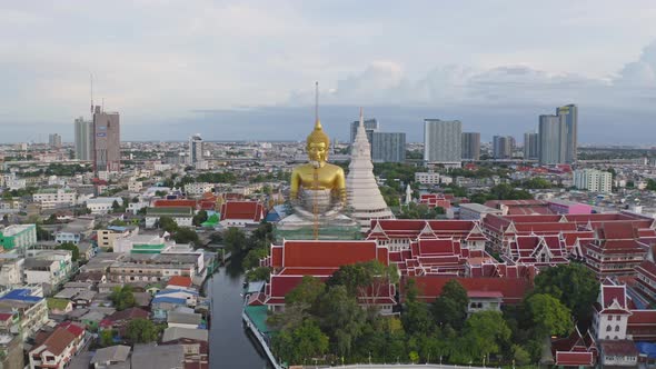 Aerial view of the Giant Golden Buddha in Wat Paknam Phasi Charoen Temple