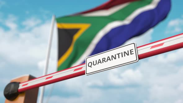 Barrier with QUARANTINE Sign Opened at Flag of South Africa alt