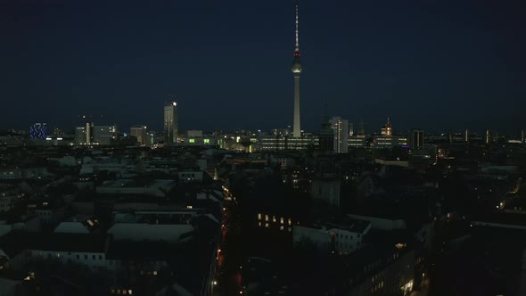 AERIAL View of Empty Berlin Germany Cityscape Skyline at Night with City Light During COVID 19
