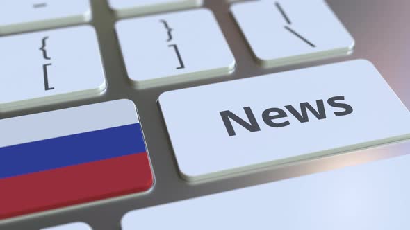 News Text and Flag of Russia on the Keys